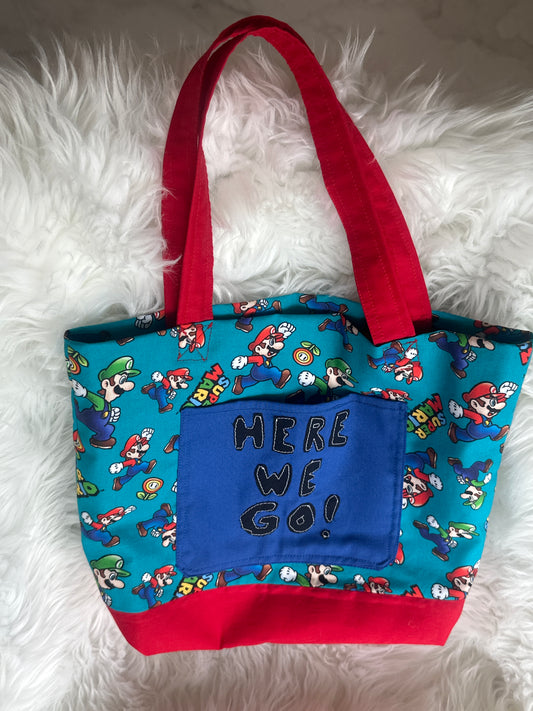 “Here We Go” tote bag
